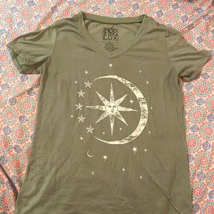 Cute light green shirt with sun and moon design.